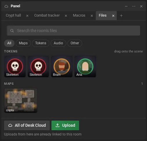 The room's Files tab: the search, the types, the tokens and maps as thumbnails (with the On the scene badge on the open map), the tracks with the play button and, at the bottom, All of Desk Cloud and Upload.